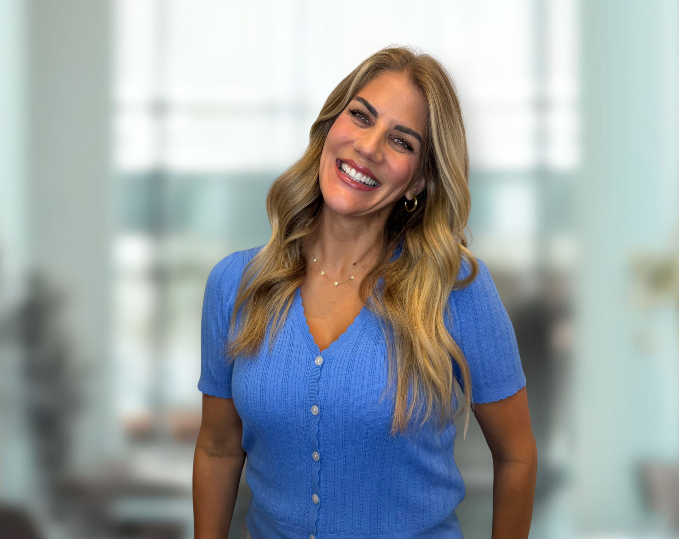 Shannon, Patient Care Coordinator at Austin Orthodontics, playful headshot