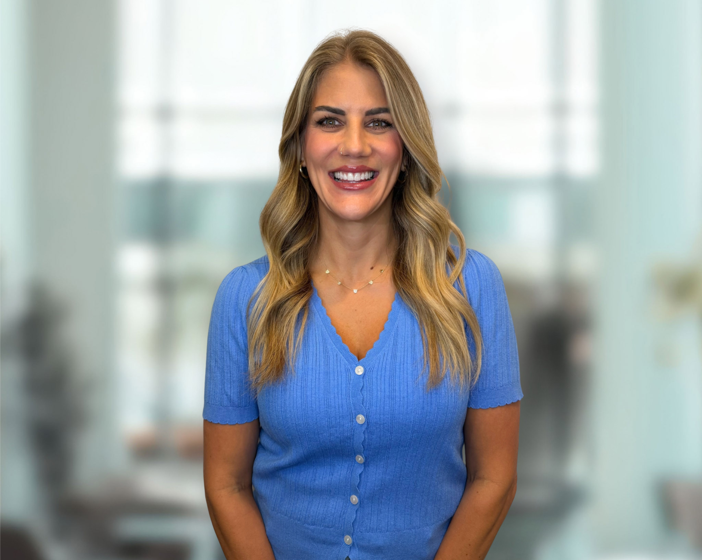 Shannon, Patient Care Coordinator at Austin Orthodontics, smiling headshot