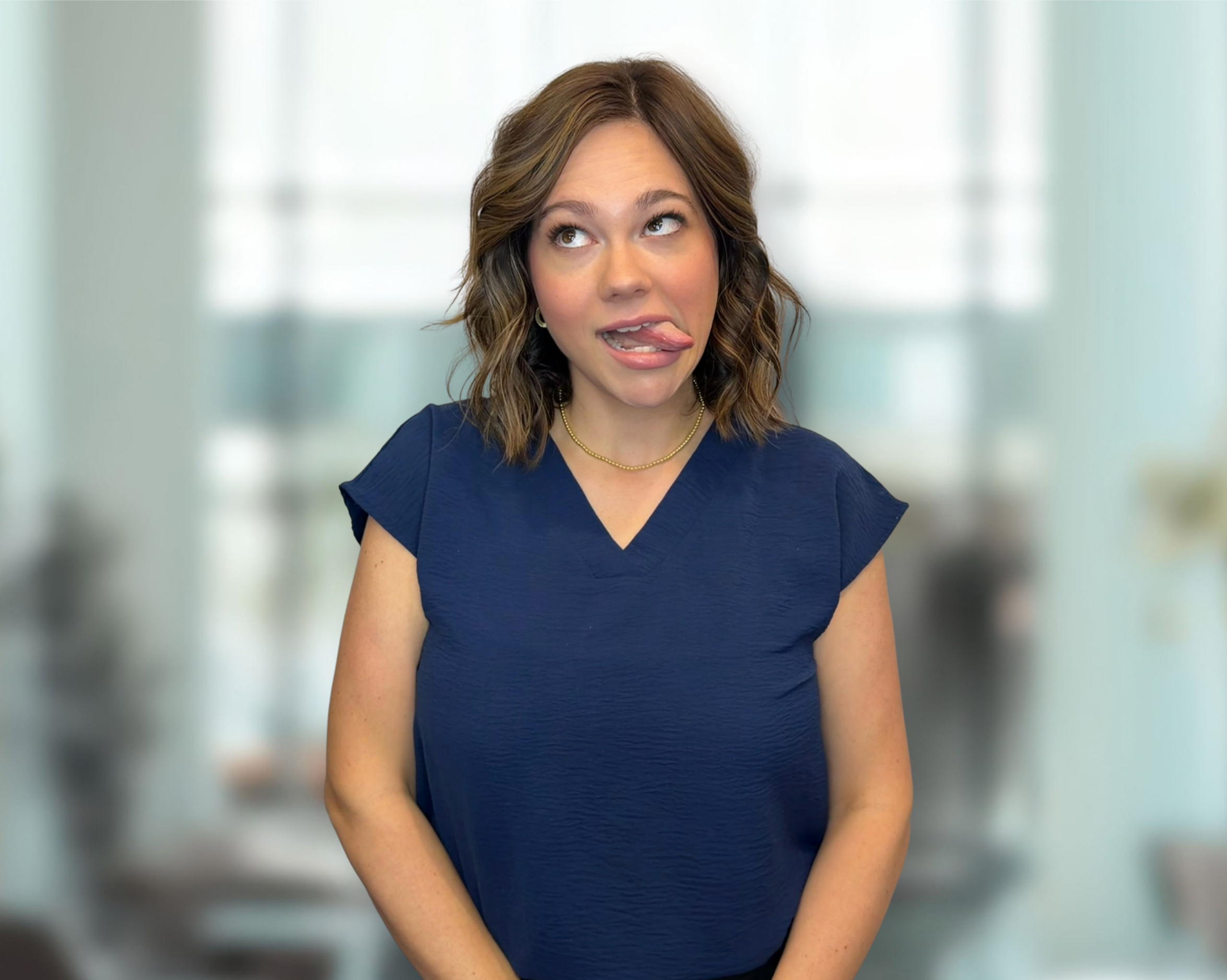 Valerie, Operations Manager at Austin Orthodontics, playful headshot