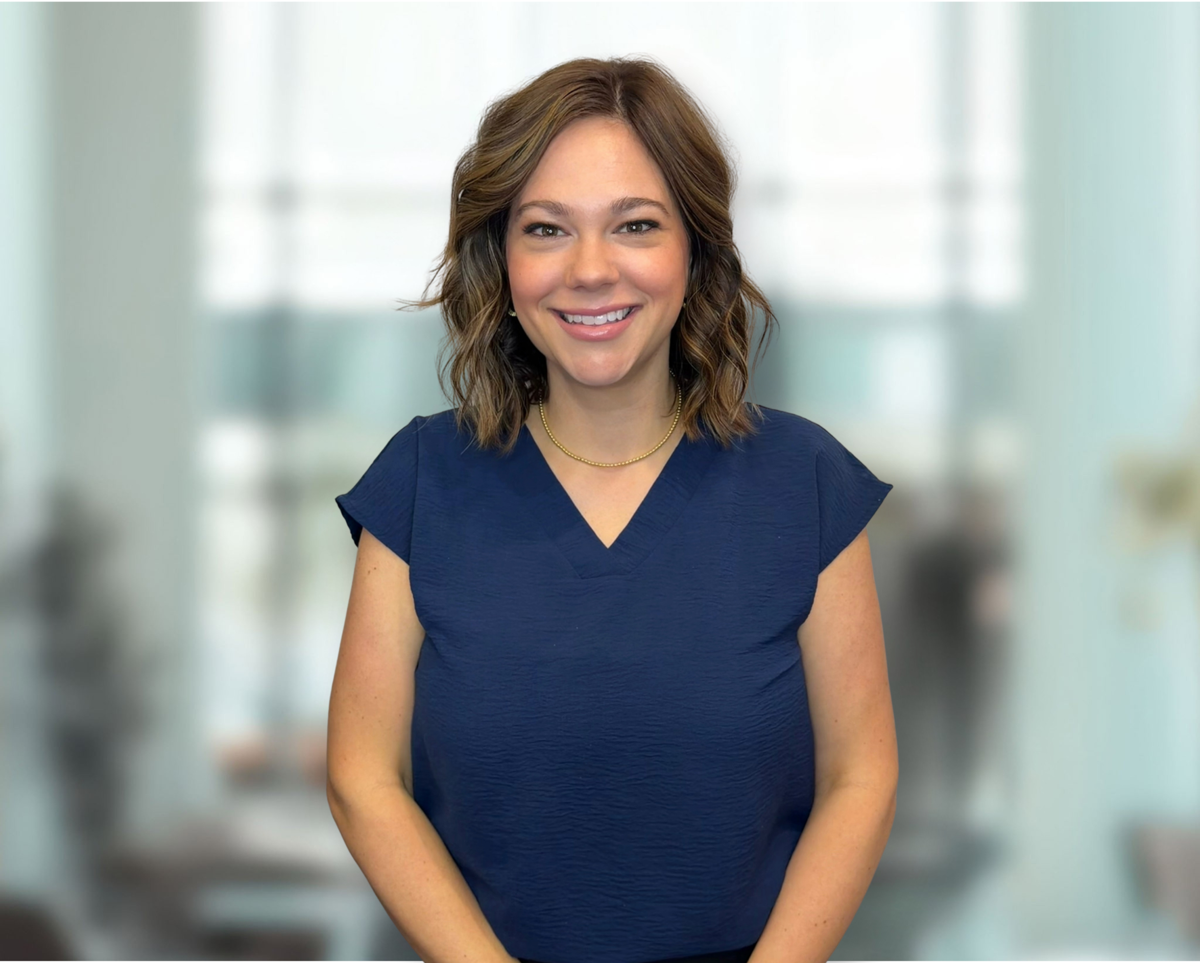 Valerie, Operations Manager at Austin Orthodontics, smiling headshot